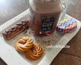 A picture of step 2 of Snickers chocolate Milk shake.