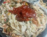 A picture of step 6 of Chicken fettuccine creamy pink pasta.