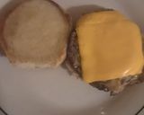 A picture of step 5 of 15 Cent Diner Fried Egg Sandwich with cheese.