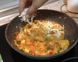 Foto del paso 7 de la receta: Calabacines rellenos con atún y pimientos
