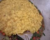 A picture of step 5 of Double tadka lahsuni Palak khichdi.
