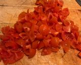A picture of step 3 of Ceviche with avocado, cherry tomatoes and spring onions.