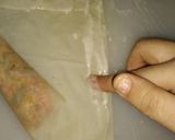 A picture of step 10 of Tikka spring rolls.