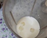 A picture of step 2 of Strawberry crushed milk shake with vanilla ice cream.