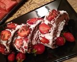 A picture of step 9 of Chocolate Roll with Whipped Cream and Strawberries.