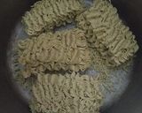 A picture of step 1 of Specialist indomie noodles.