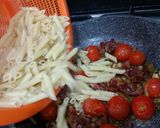 Foto del paso 7 de la receta Macarrones picantes con jamón ibérico