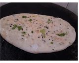 A picture of step 7 of Aloo Paneer Stuffed Kulcha.