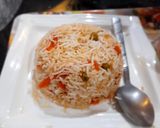 A picture of step 8 of Fried rice with chicken jalfrezi.