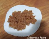 A picture of step 9 of Dudh Puli Rice dumplings cooked in milk.