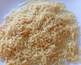 A picture of step 1 of Angel hair pasta coated fish balls.