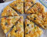 A picture of step 5 of Petal Shape Cheesy Pizza 🍕🍕.