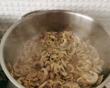 A picture of step 2 of Creamy Mushroom soup, drizzle truffle oil, rustic croutons.
