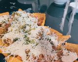 A picture of step 23 of Cheesy nachos platter😋😋❤️.