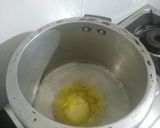 A picture of step 1 of Healthy Daliya Khichdi.
