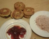 A picture of step 8 of Jam tarts with coconut.
