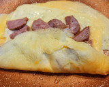 Foto del paso 3 de la receta: Tortilla rellena de butifarra y queso