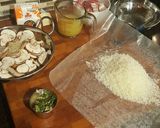 A picture of step 10 of Roast Chicken Thighs in a Sautéed Mushroom Parmasan Garlic Cream.