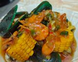 Foto langkah ke 9 dari resep Seafood saos padang 🦐🦞🦑🦪🌽🧅🍤.