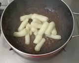 A picture of step 8 of Korean chewy garlic Potato in Red sauce.
