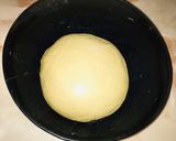 A picture of step 25 of Bow tie bun.