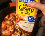 Foto del paso 4 de la receta: Arroz de pollo al ajillo