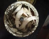 A picture of step 1 of Ilish Bhape.