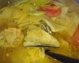 Hình bước làm 5 của món Canh măng chua đầu cá hồi