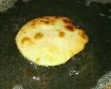 A picture of step 5 of Malpua with Rabri.