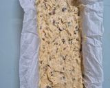 Foto del paso 5 de la receta: Budín de frutos secos aromatizado con mandarina