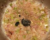 Foto del paso 5 de la receta Choquitos a la plancha en su tinta, con aceite de ajo y perejil