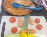 A picture of step 1 of Humus sandwich with rocket and crunchy bright salad.