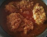 Foto del paso 5 de la receta: Pollo empanizado con queso en salsa de tomate