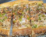 A picture of step 6 of Turkish veggi pide with egg.