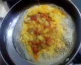 A picture of step 10 of Memon's Fusion Omelette.