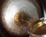 A picture of step 4 of Italian honey balls.