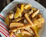 Foto del paso 4 de la receta Conejo a la naranja con patatas fritas