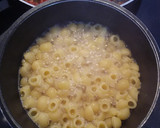 Foto del paso 3 de la receta: Pasta tiburón gratinada con guisantes
