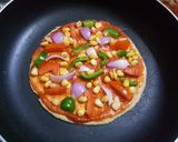 A picture of step 5 of Wheat base veg. tawa pizza.