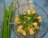 Foto langkah ke 5 dari resep Tumis Tahu Bunga Bawang.