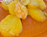 Foto del paso 8 de la receta Patatas confitadas al aroma de langostinos al ajillo