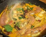 A picture of step 10 of Fish curry with coconut + turmeric.