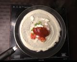 A picture of step 2 of Schezwan paneer masala dosa.