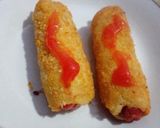 A picture of step 7 of Super simple sausages sandwich roll.