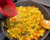 Foto del paso 8 de la receta: Arroz de pollo y verduras al ras el hanout. 2x1