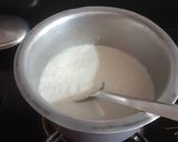 A picture of step 1 of Kesar Rice Pudding.