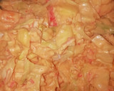 Foto del paso 4 de la receta: Góndola de piña rellena de cóctel de marisco