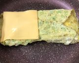 A picture of step 3 of Omelette Cheese Toasted Sandwich.