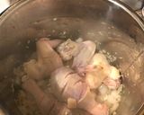 A picture of step 4 of Chicken Arroz Caldo.