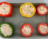 Foto del paso 8 de la receta: Pimientos y tomates rellenos de arroz en salsa de tomate al horno al estilo griego